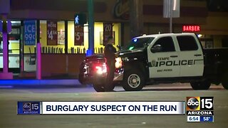 Burglary suspect on the loose after hitting Tempe officer's car