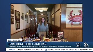 Bare Bones Bar and Grill says "We're Open Baltimore!"