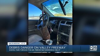 Woman escapes without serious injuries after flying shovel hits windshield