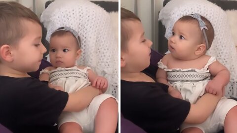 Big Brother Sweetly Kisses His New Baby Sister