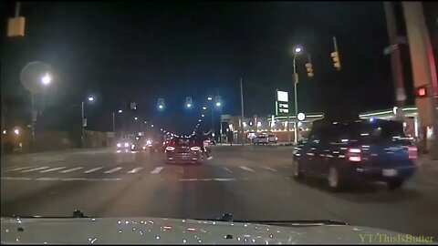 Suspect hanging out of car fires 8 shots at Detroit police during attempted reckless driving stop