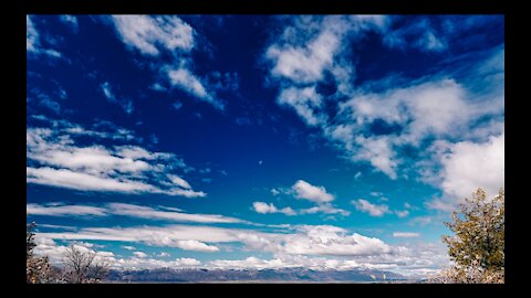 Time Flys (Time-lapse, daytime moon, cloudy sky, and mountains.) 4K