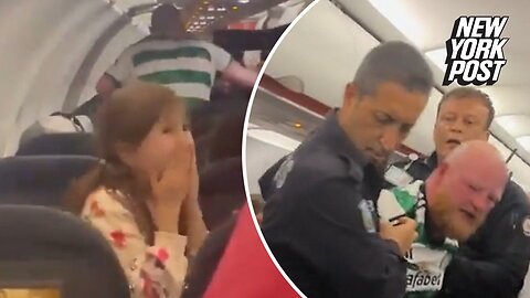Unruly thug filmed fighting with cops on flight, scaring little girl sitting mere feet away