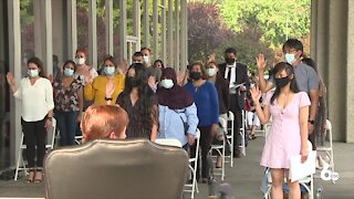 59 people become new U.S. citizens in three outdoor ceremonies