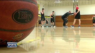 East Troy Trojans basketball team at the top of their game