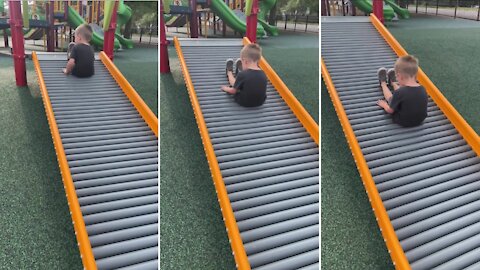 Kid Makes Funny Sound Going Down The Slide