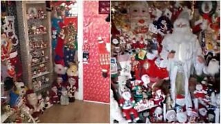 Man decorates house with over 300 Santas!