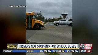 Pasco County mom captures vehicles continually not stopping for school buses