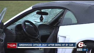 Greenwood officer struck by vehicle while directing traffic