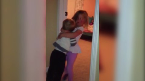 Little Girl Carries Her Tot Brother Out Of Her Room