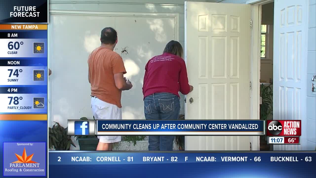 Area residents help to clean up after community center vandalized