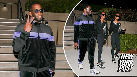 Sean 'Diddy' Combs flashes peace sign days after feds raid homes