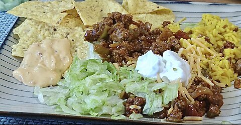 Mexican Feast: beef & rice burrito and deluxe nachos
