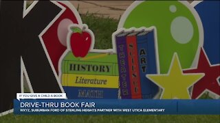 Drive-thru book fair with WXYZ, Suburban Ford of Sterling Heights
