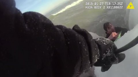 Chicago Police Officers save man & dog from frozen Lake Michigan