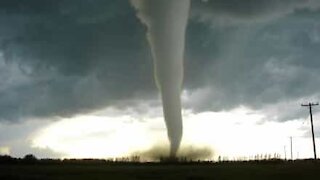 Devastating tornado filmed from inside a car