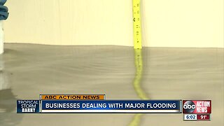 Residents begin seeing flooding, damage from Tropical Depression Barry