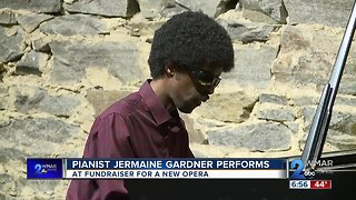 Blind pianist performs at fundraiser for a new opera