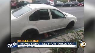 thieves swipe tires from parked car