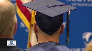 Inmates receive their diplomas at NWTC