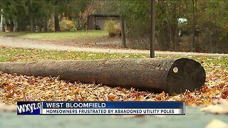 Homeowners frustrated by abandoned utility poles