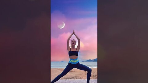 Czarina Irena practicing Yoga in Black Leggings with Blue Waist band.