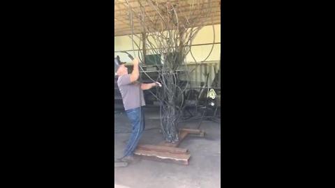 Man sculpts trees from metal in retirement