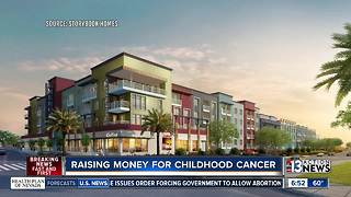New apartment complex raises money for children fighting cancer