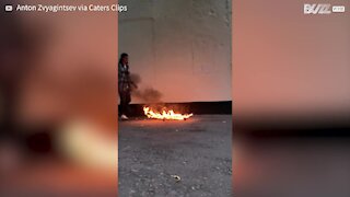 Skater pulls fiery trick