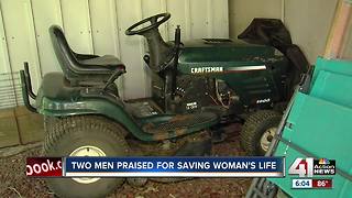 2 men, neighbors help woman pinned under riding lawnmower