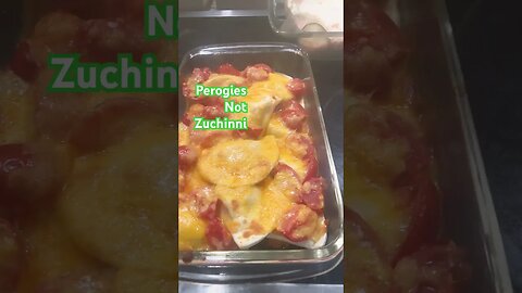 Perogies cheese, tomato casserole