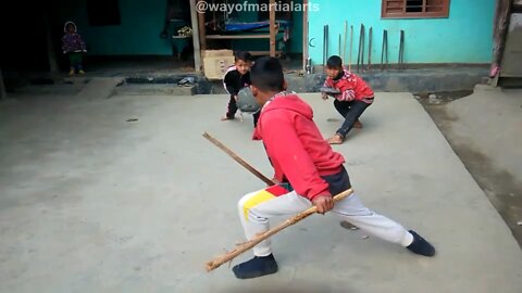 Indian martial arts kids stick fighting