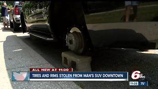 Tires and rims stolen from man's SUV in downtown Indy overnight