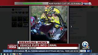 Car into canal rescue