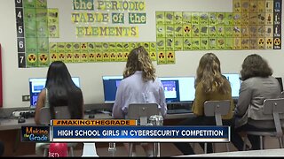 High school girls competing in cybersecurity competition