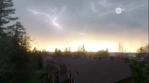 Lighting strikes across the sky during sunset