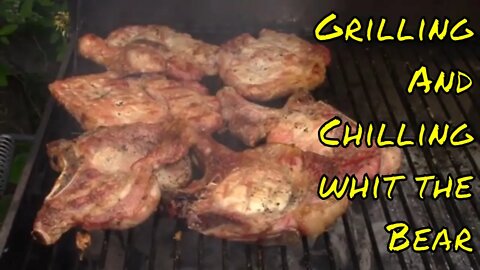 What's cooking with the Bear? Grilling thick cut pork chops on the Thermos charcoal barrel grill