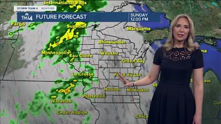 Breezy and partly cloudy Sunday