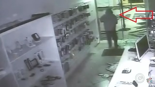 Robber Face Plants into Glass Door