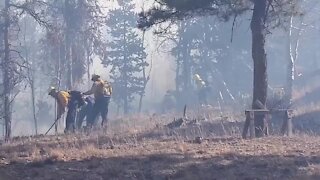 Crews on the ground battle Miner's Candle Fire