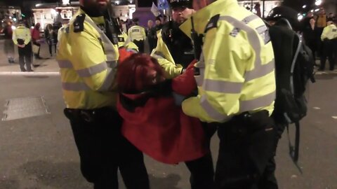 Police carry female protester out of the road #extinctionrebellion
