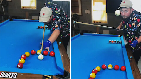 Spectacular movements of a man in a game of billiards