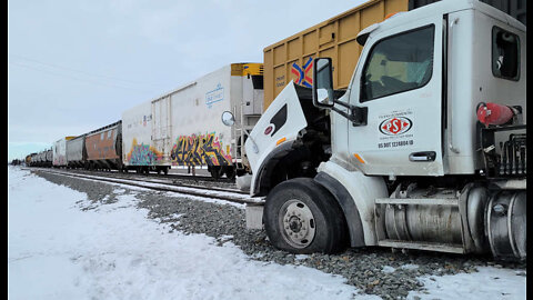 Train Collides with Garbage Truck