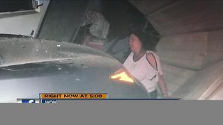 Woman survives after stolen car hits her home