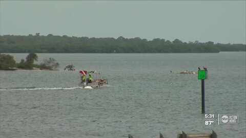 Crews in Clearwater work to remove derelict, submerged boats from waterways