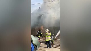 WATCH: Baltimore City Fire crews battle blazes at two row homes in Penn North neighborhood