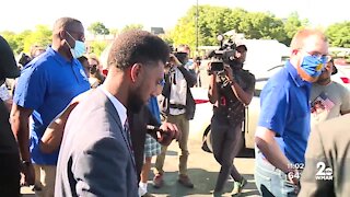 Mayor walks with residents in Mondawmin neighborhood during violent week