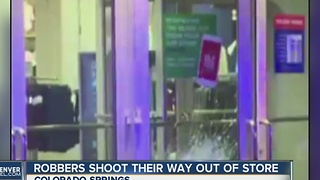 Robbers shoot their way out of store