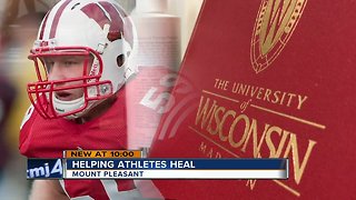 Former Wisconsin Badgers football player tries to help heal injuries after suffering from so many