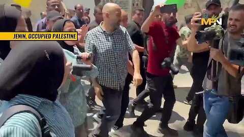 Classmates of Sadeel Naghnghiyeh carrying her body at her funeral in Jenin